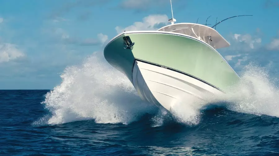 How do traditional Deep-V hull designs compare  to their high-speed, stepped hull counterparts?