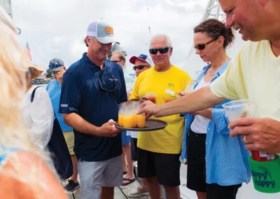 Bluewater's Baxter Lusink hands out cocktails at the Summer Cruise