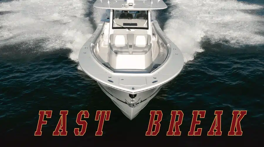 Front view of a Regulator 41 center console speeding across the water with the caption 'Fast Break