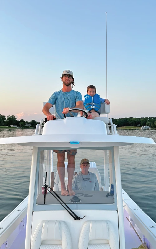 Wayne Enroughty's family on the second helm station of the Regulator 30XO, enjoying the elevated view and bonding time